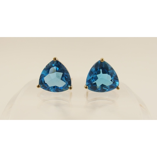 114 - A pair of blue topaz earrings