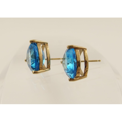 114 - A pair of blue topaz earrings