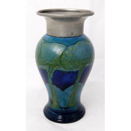 668 - A Moorcroft pottery 'Moonlit Blue' vase