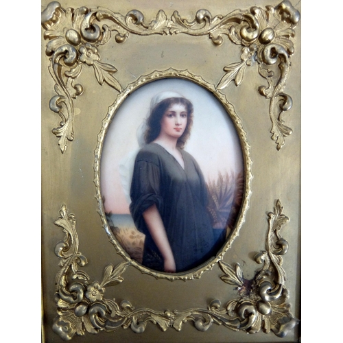 678 - A Berlin porcelain framed oval plaque