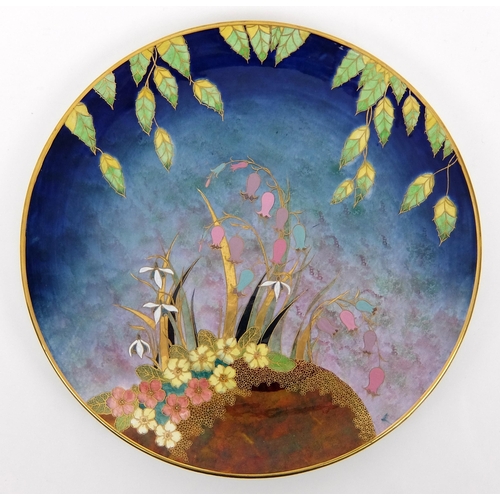 679 - A Carlton Ware primulas and bluebells enamelled wall plaque