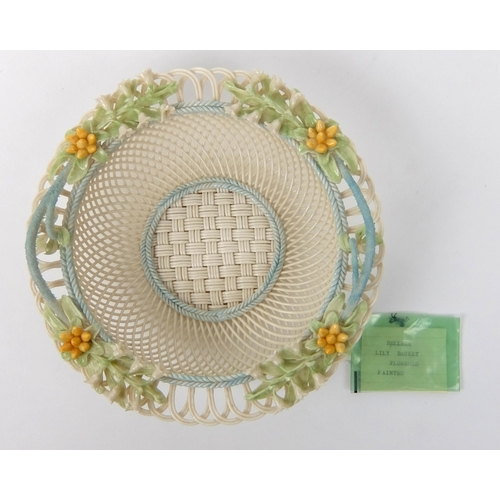 705 - A Belleek porcelain Lily of the Valley four strand basket