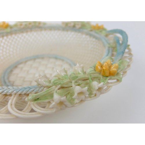 705 - A Belleek porcelain Lily of the Valley four strand basket