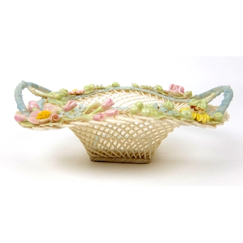 706 - A Belleek porcelain oval floral four strand basket