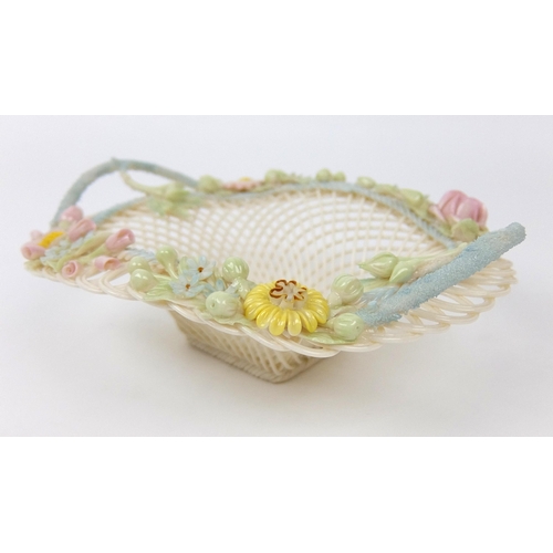 706 - A Belleek porcelain oval floral four strand basket