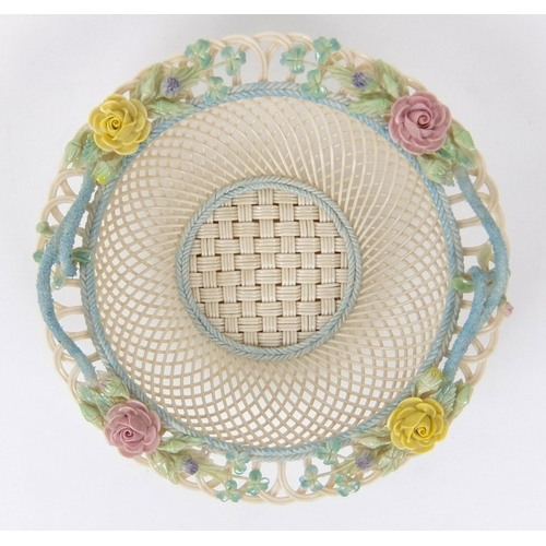 707 - A Belleek porcelain four strand circular floral basket