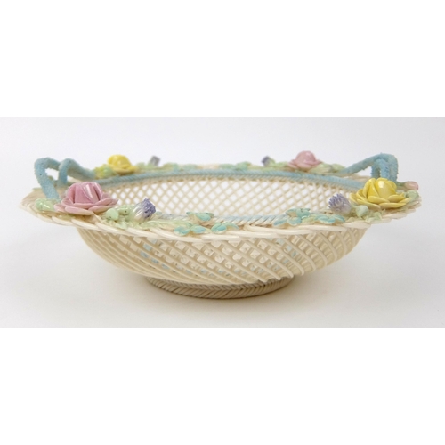 707 - A Belleek porcelain four strand circular floral basket