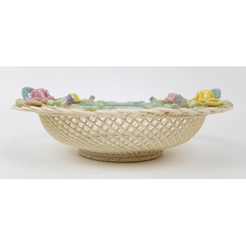 707 - A Belleek porcelain four strand circular floral basket