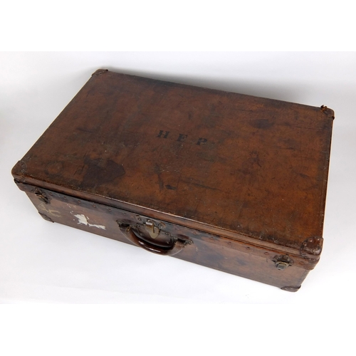 708 - An early 20th century Louis Vuitton Brown leather suitcase