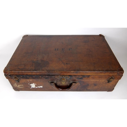 708 - An early 20th century Louis Vuitton Brown leather suitcase