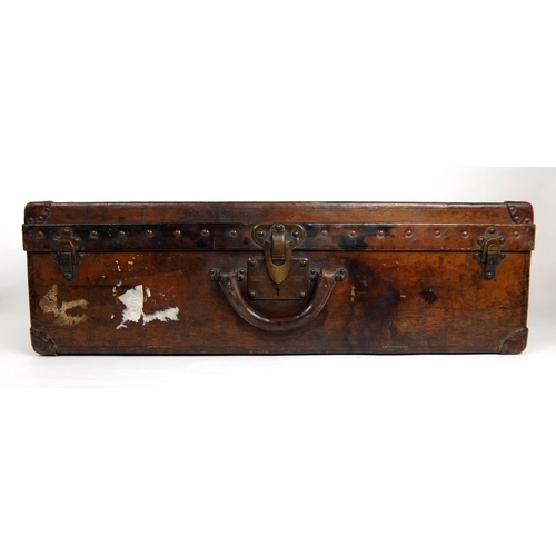 708 - An early 20th century Louis Vuitton Brown leather suitcase