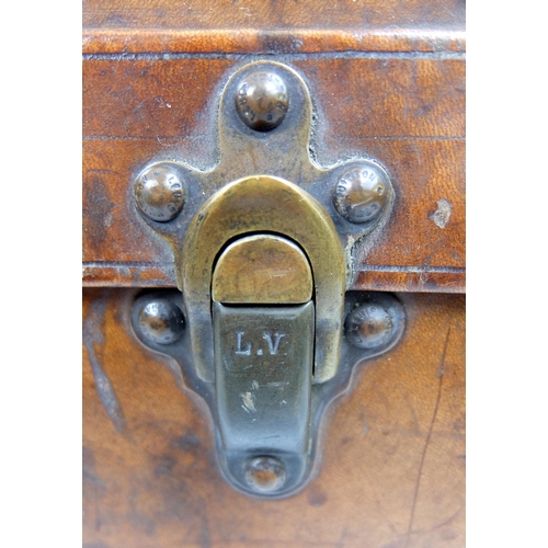 708 - An early 20th century Louis Vuitton Brown leather suitcase