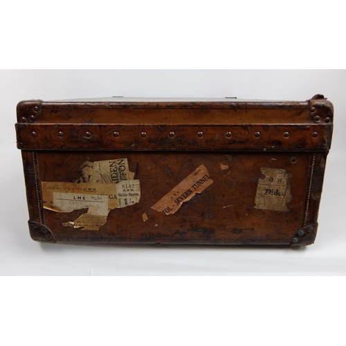 708 - An early 20th century Louis Vuitton Brown leather suitcase