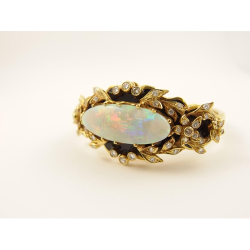 71 - An impressive opal bangle