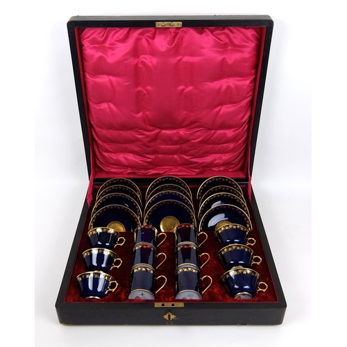 712 - A 19th Century cased Sevres porcelain coffee set