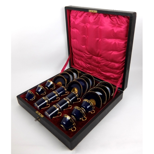 712 - A 19th Century cased Sevres porcelain coffee set