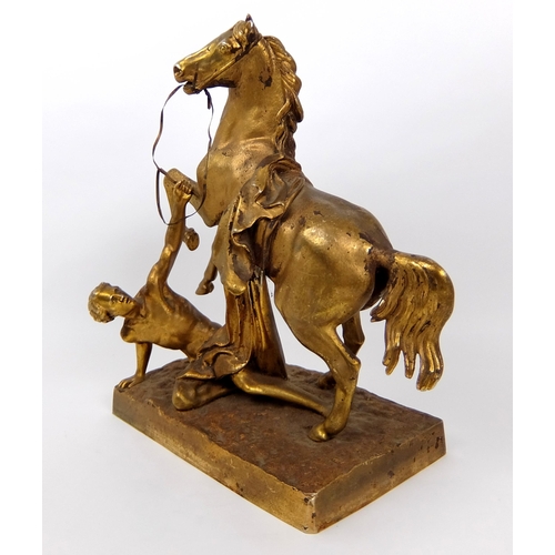 713 - A 19th Century gilded and cast metal stallion with dying Gaul