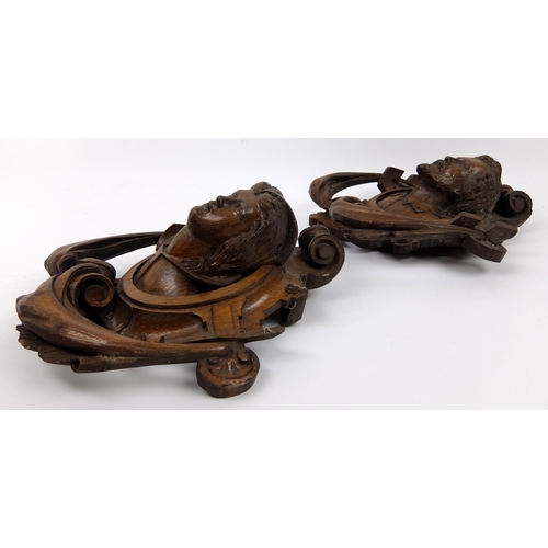 714 - A group of seven 19th Century carved oak figural furniture ornamentation