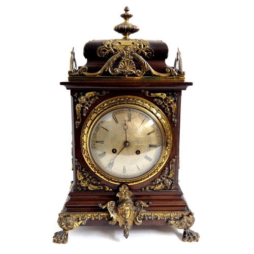 716 - A late 19th/early 20th Century mahogany mantle clock