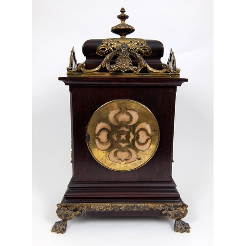 716 - A late 19th/early 20th Century mahogany mantle clock