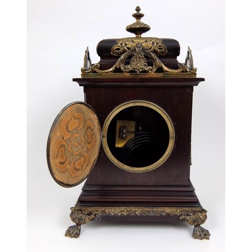 716 - A late 19th/early 20th Century mahogany mantle clock