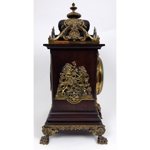 716 - A late 19th/early 20th Century mahogany mantle clock