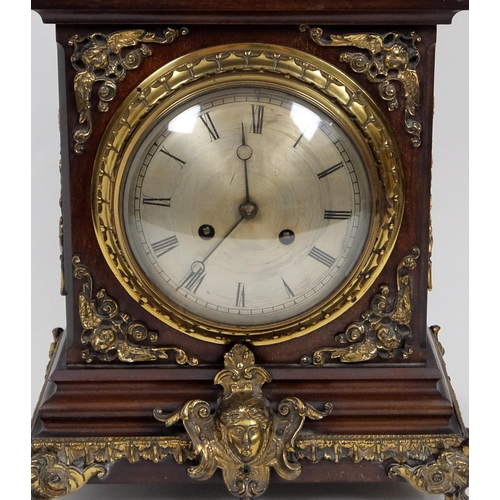 716 - A late 19th/early 20th Century mahogany mantle clock