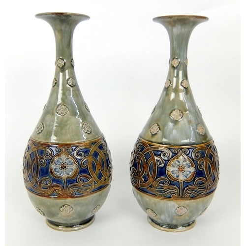 719 - A pair of Royal Doulton baluster shaped vases