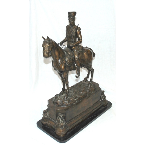 726 - After the antique  a bronze model of a Cavalry Officer on horseback