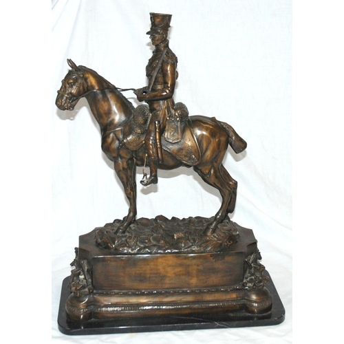 726 - After the antique  a bronze model of a Cavalry Officer on horseback