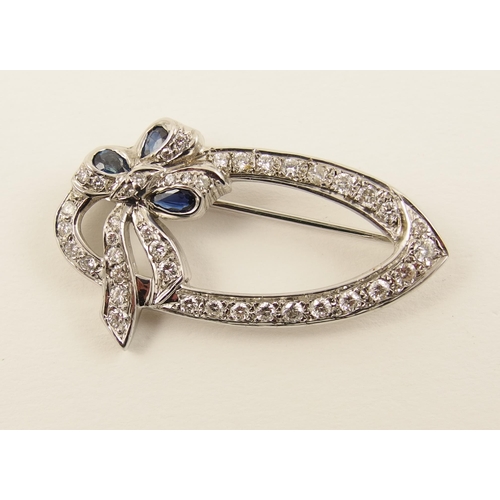 80 - A diamond set brooch