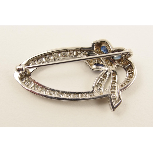 80 - A diamond set brooch