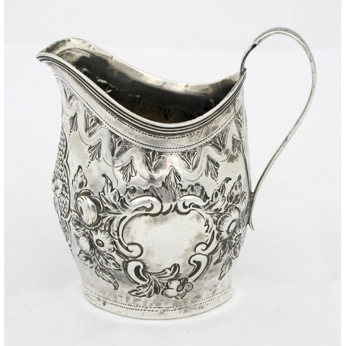 217 - A George III silver cream jug  maker's marks rubbed  possibly IB  London 1798