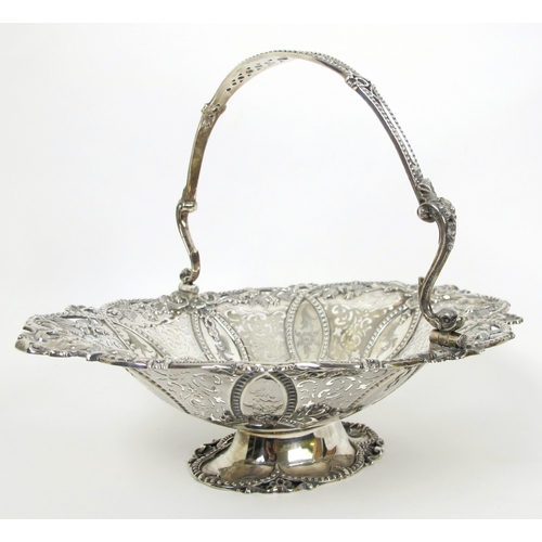 226 - A silver swing handled fruit basket by Roberts & Hall  Sheffield 1853