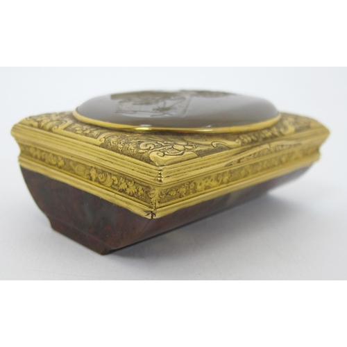 315 - An 18th Century gilt metal and agate portrait intaglio snuff box