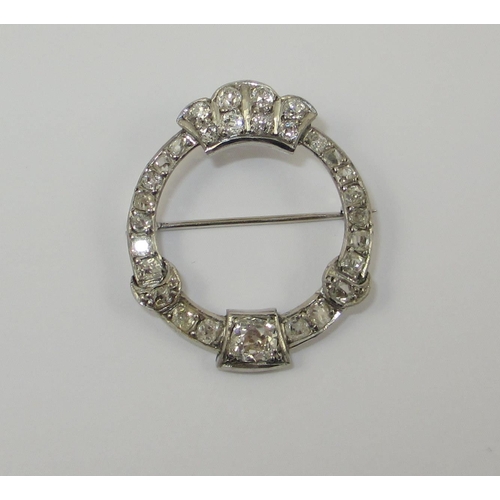 5 - A diamond set garland brooch