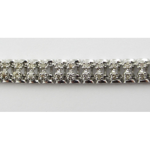 63 - A diamond set bracelet