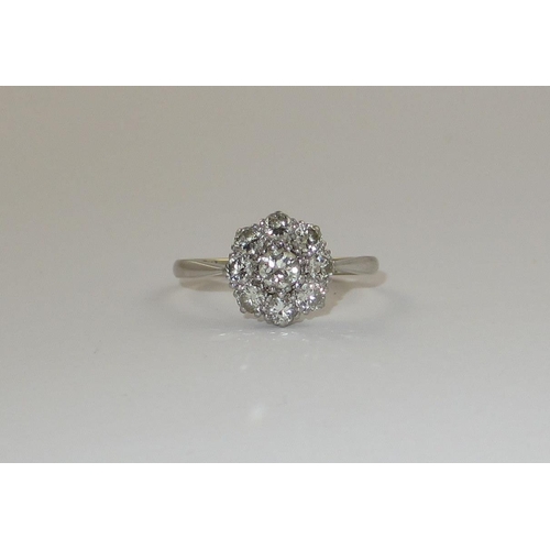 68 - A diamond flower ring