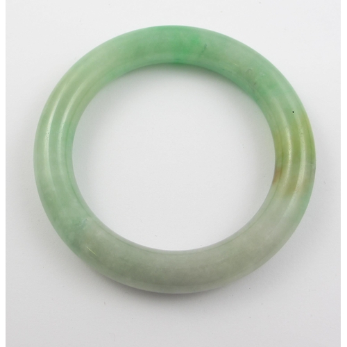 70 - A Chinese jadeite bangle