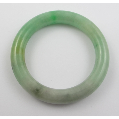 70 - A Chinese jadeite bangle