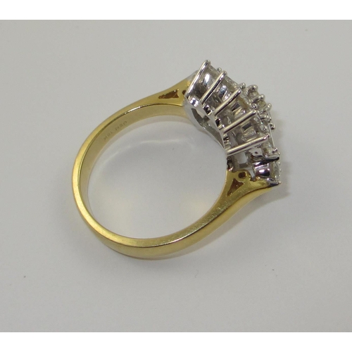 74 - An 18ct mixed cut diamond ring