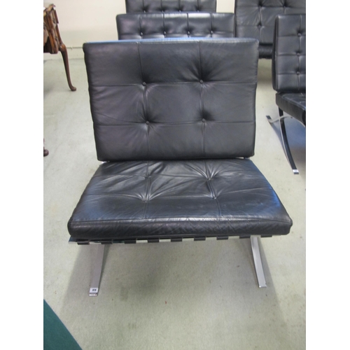 826 - A modern Barcelona black leather and chrome chair