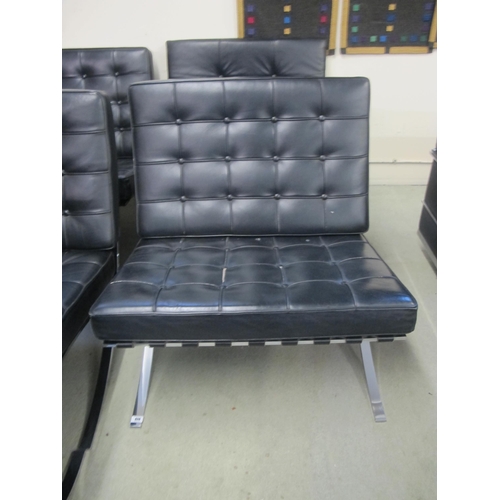 828 - A modern Barcelona black leather and chrome chair