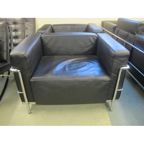 834 - A modern LC/2 black leather and chrome armchair designed by Corbusier