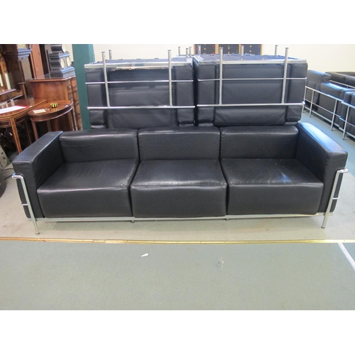 836 - A modern black leather and chrome three seater settee designed by Corbusier