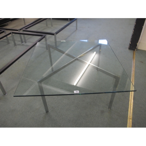 842 - A modern Barcelona glass top coffee table on chrome supports