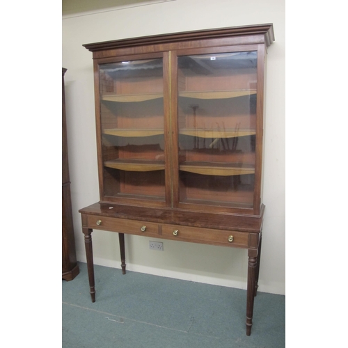 847 - A Regency mahogany bookcase on table base possibly by Gillows of Lancaster