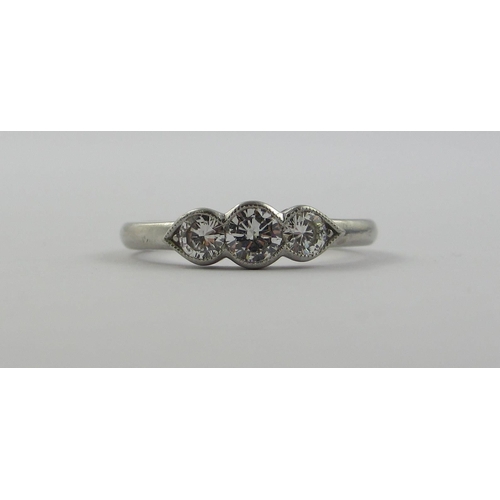 92 - A three stone diamond ring