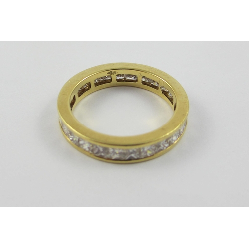 10 - A princess cut diamond eternity ring