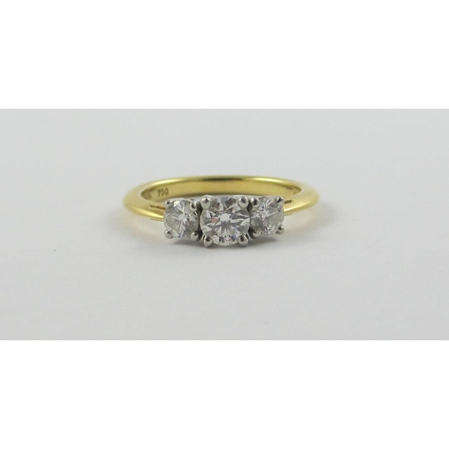 25 - A Tiffany & Co three stone diamond ring